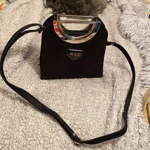 NYC fashion handbag with metal handles